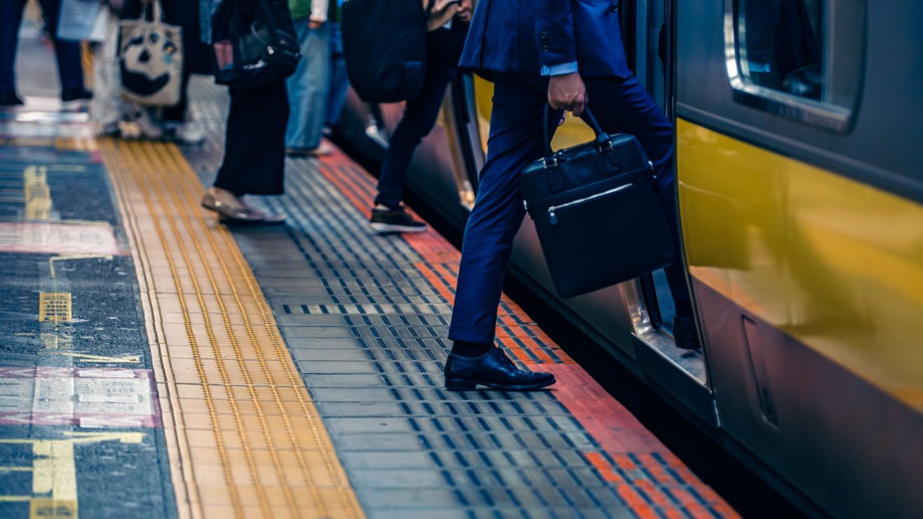 Close,Up,People,Feet,Walking,Over,The,Gap,Between,A